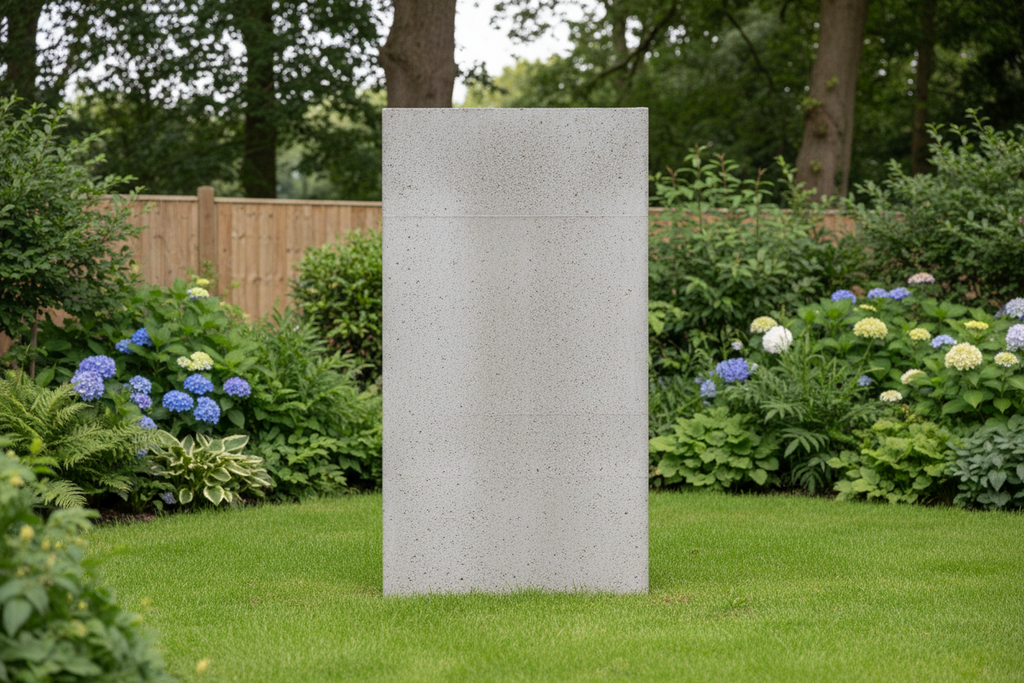 Concrete fence panel in garden